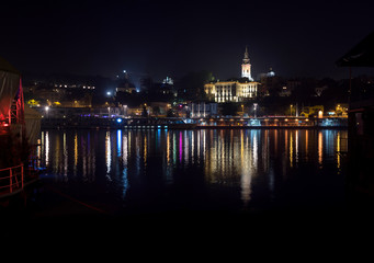Fototapeta na wymiar Night cityscape on the river