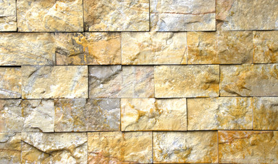 pattern gray color of modern style design decorative uneven cracked real stone wall surface with cement.