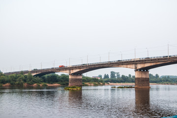 Bridge on the river on a summer evening