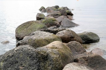 stones or rocks in calm water