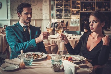 Stylish couple in a restaurant