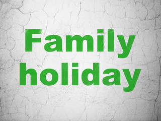Tourism concept: Family Holiday on wall background
