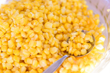corn seed boiled in spoon