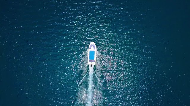 Air flight over the boat in the sea