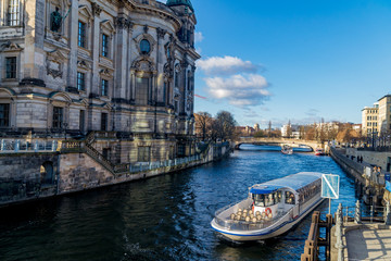 Berlin, Germany - December 02, 2016: Tourist boat on the background of the Cathedral in Berlin. © dizfoto1973