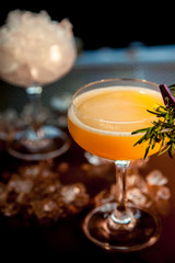 Vertical image of a refreshing summer peach cocktail