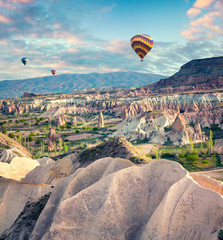 Fototapeta na wymiar Flying on the balloons early morning in Cappadocia.
