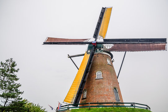 View on wooden windmill by Bruges in Belgium