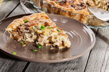 Slice of tart with chicken amd mushrooms