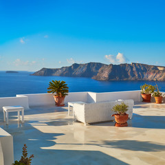 Fototapeta na wymiar A view of beautiful sea and caldera with luxury roof terrace