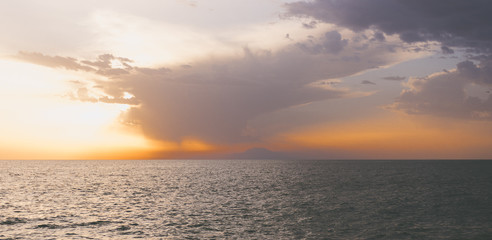Naklejka na ściany i meble Sunset at the sea. Seascape