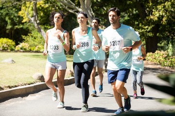 Marathon athletes running in the park