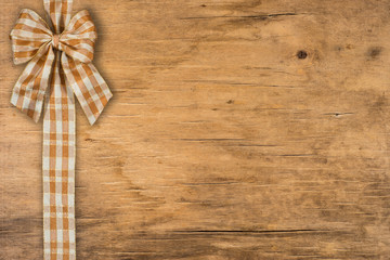 Decorative  ribbon on the old wooden table.