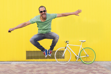 Handsome young man jumping.