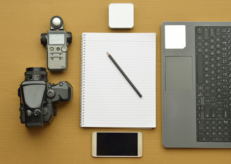Fototapeta premium Top View of Photographers Desk