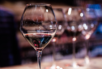 Red wine in glasses. Shallow depth of field.