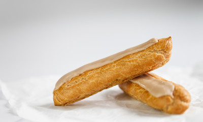 Eclairs on white background