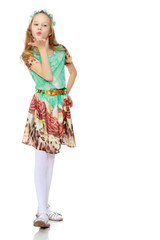 Girl blowing on the palm.