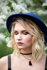 Beautiful girl in the hat closed eyes