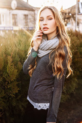 Gorgeous fashionable young blonde girl street portrait