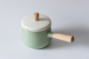 The green enameled pots, indoors