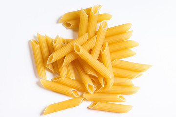 Heap penne pasta isolated on white background.