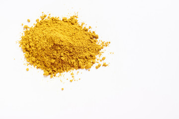 Heap of curry. Isolated on white. Empty space for text or inscription. Top view.