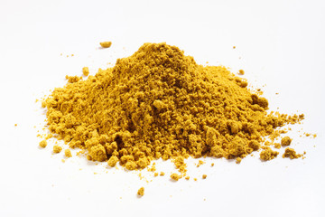 Heap of curry. Isolated on white