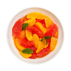 Orange and Grapefruit Citrus Salad Isolated on White Background. Selective focus.