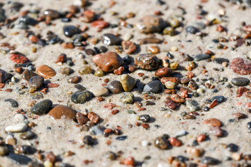 Colorful rocks on a Baltic sea beach, summer time.