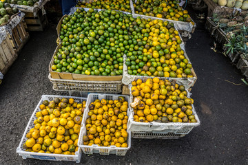 Oranges in white plastic box in traditional fruit market photo taken in Bogor Indonesia