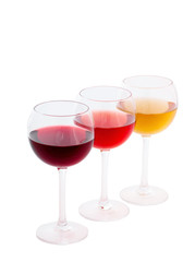 Red, white and rose wine glasses up on white isolated. Top view..