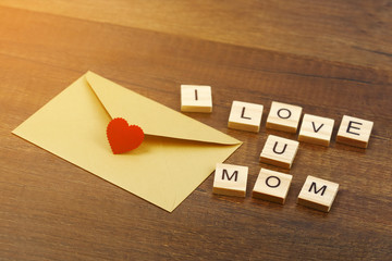 I love mom wording on old wood mother's day concept.