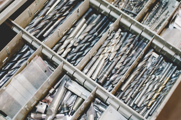 High angle view of drill bits in toolbox