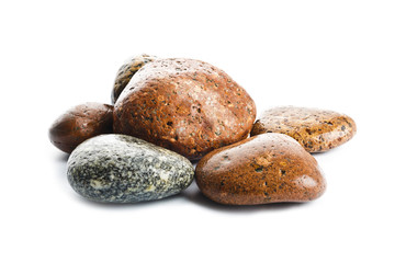 Wet sea stones isolated on white background