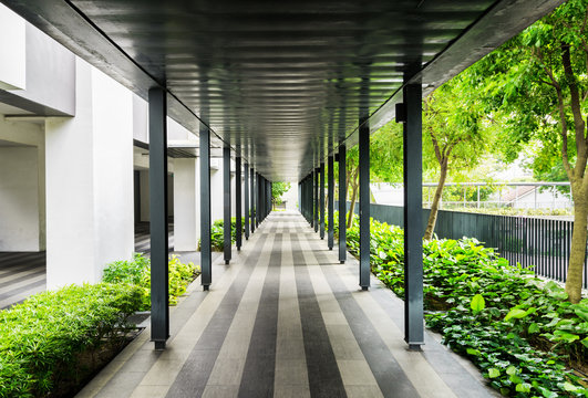 Outside walkway along a building. Modern open corridor