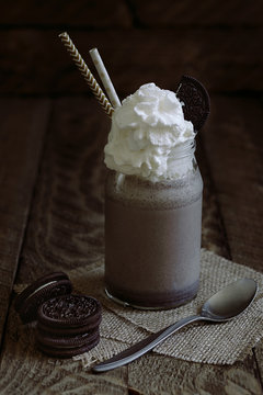 Cookies And Cream Milkshake In A Glass Jug