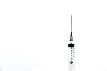 Syringe on white background