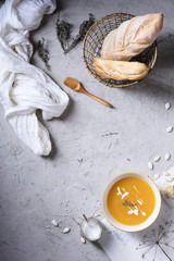 Pumpkin cream Soup with freshly baked bread and sour cream.
