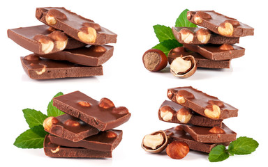Chocolate with hazelnut and mint leaf isolated on white background. Set or collection