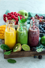 Colorful smoothies in bottles, detox summer diet fresh drink for breakfast or snack. - 151242176