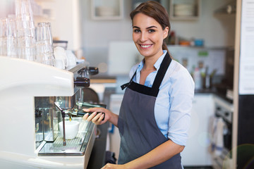 Woman working in coffee shop
