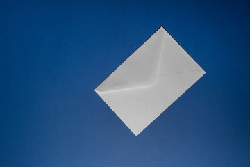 Envelope on blue background.