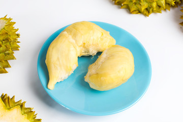 Durian fruit piece on blue plate