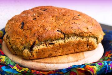 Fresh homemade bread on a wooden cutting board