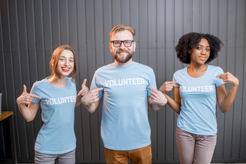 Happy volunteers indoors