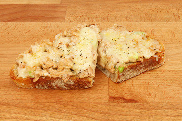 Tuna melts on a wooden board