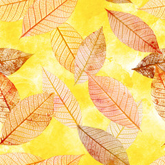 Seamless background pattern of skeleton leaves on golden waterco