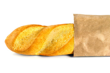 Freshly baked baguette caked in a bag of paper