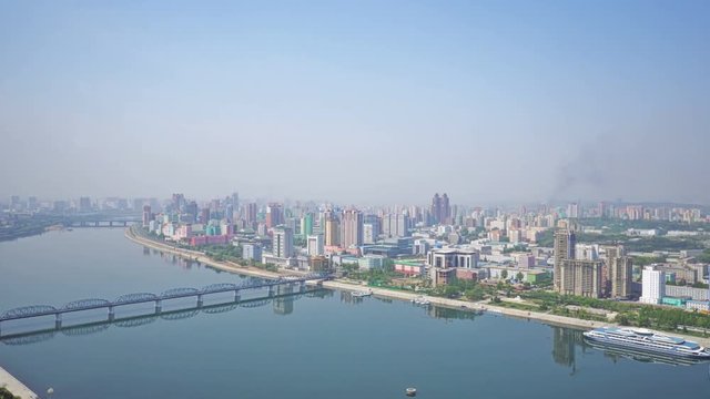 Panoramic view of Pyongyang and the Taedong river in the morning.  DPRK - North Korea. May 02, 2017. UHD - 4K